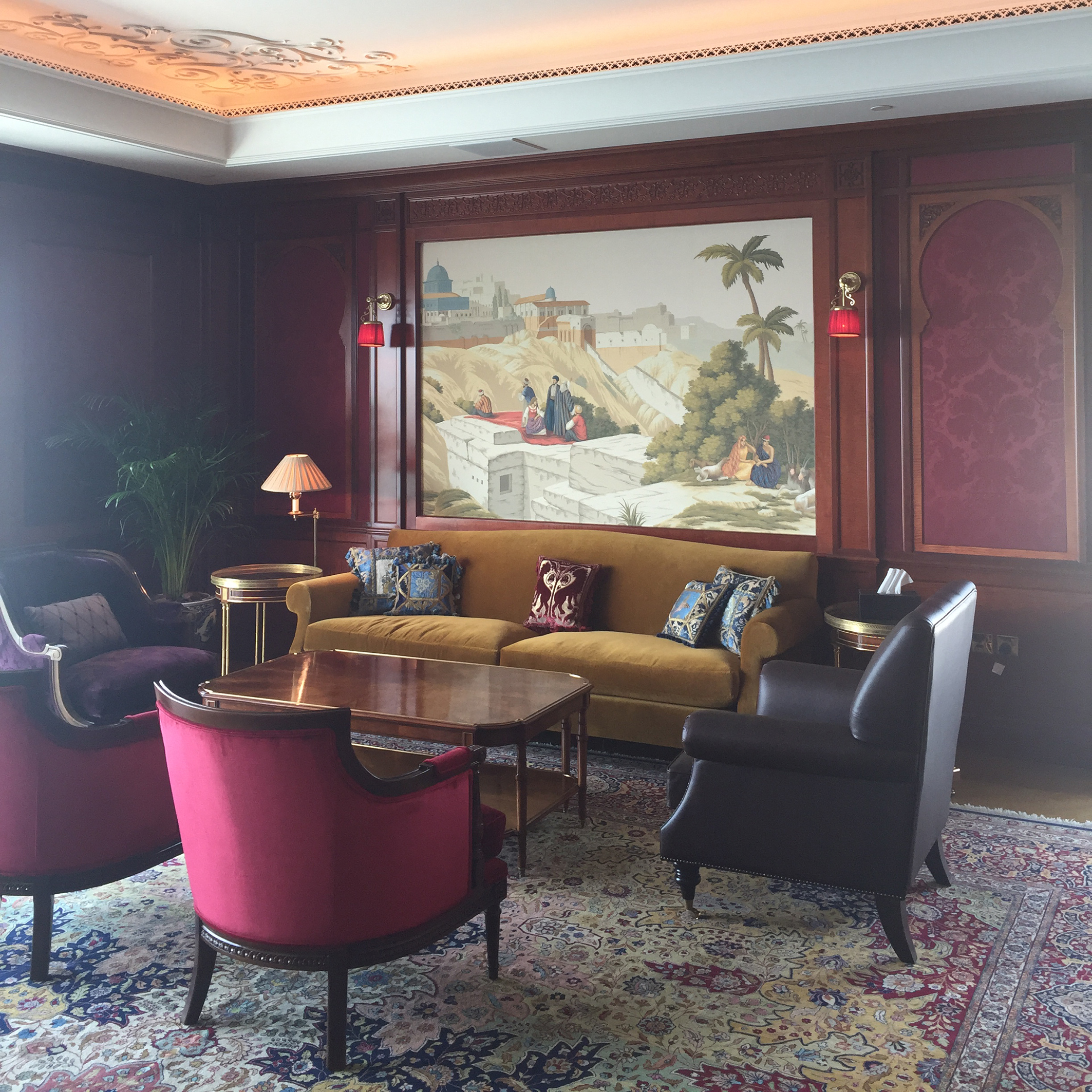 The Penthouse features high end finishes, such as hand painted wallpaper, real and faux stone effects, timber panelling, inlaid marble flooring, and gold leaf detailing.