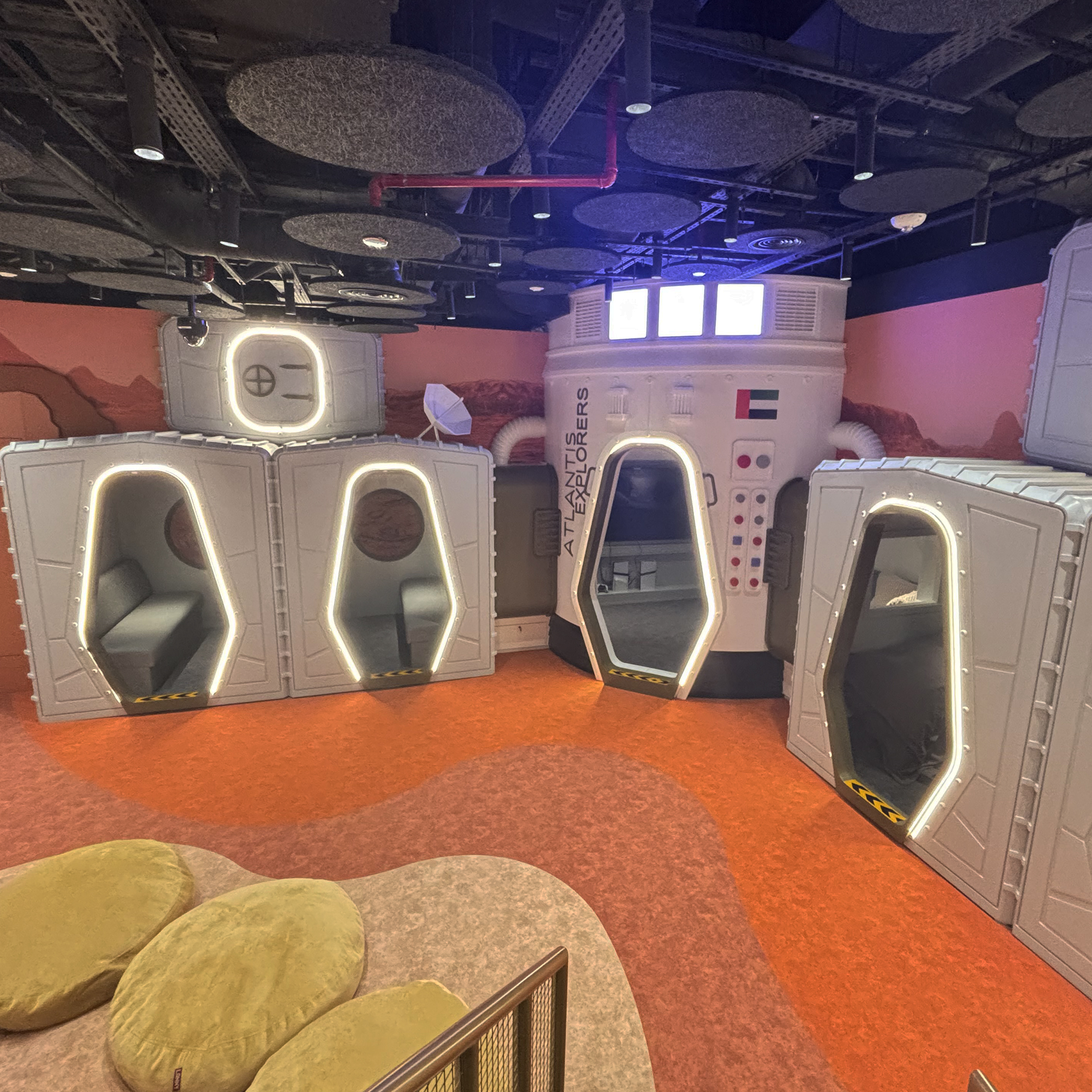 The Gaming Room has small pods where groups of friends can gather to play games or join others in the larger spaceship for VR experiences. Dawsons were responsible for all ID and FF&E elements.