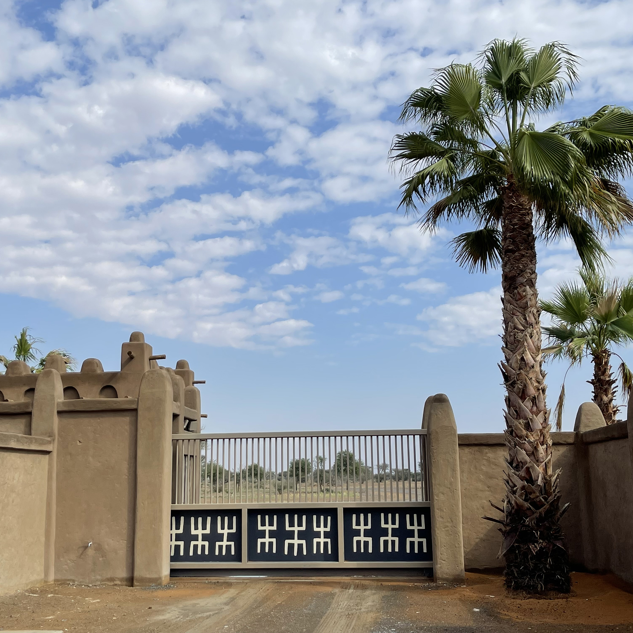 The double gated buildings separate the pedestrian and animal areas.  Patterns from traditional fabric were used to provide geographical context for the buildings.
