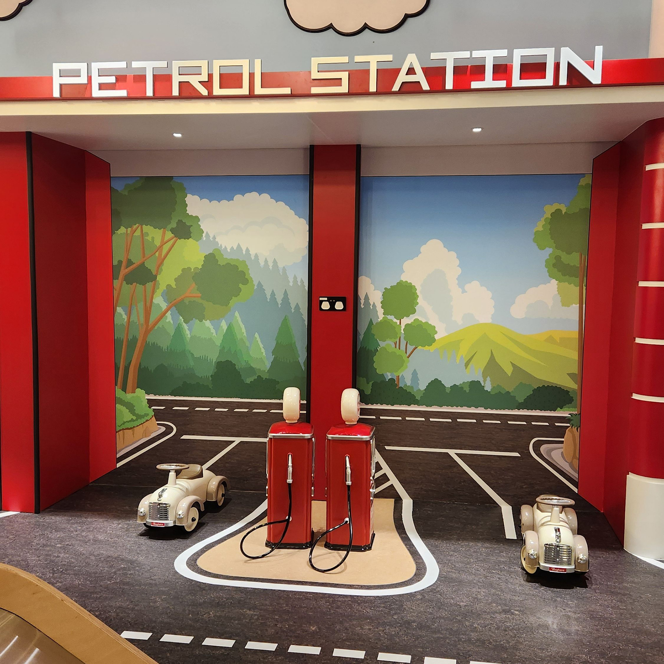 The Village Petrol Station. The theming is continued through custom wallpaper designed by Dawsons.